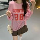 Long-sleeve Lettering T-shirt + Pleated Mini Skirt