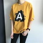 Distressed Lettering Loose-fit Short Sleeve T-shirt