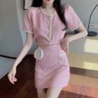 Short-sleeve Contrast Trim Top / High-waist Striped Skirt