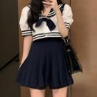 Short-sleeve Contrast Trim Bow Accent Shirt / High-waist A-line Accordion Pleat Mini Skirt
