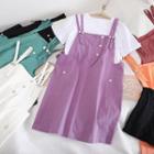 Short-sleeve Round Neck T-shirt / Buttoned Jumper Skirt