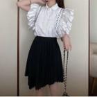 Ruffle Trim Sleeveless Shirt / Asymmetric Pleated Skirt