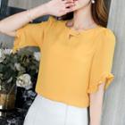 Cut-out Short-sleeve Blouse
