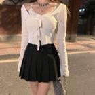 Lace-up Cardigan / Pleated A-line Skirt