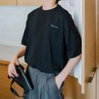 Lettering Short-sleeve T-shirt / Faux Leather Crossbody Bag
