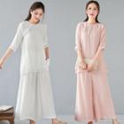 Set: Elbow-sleeve Asymmetric Buttoned Top + Wide-leg Pants