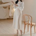 Long-sleeve Cutout Shirt / A-line Midi Skirt