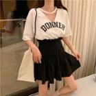 Lettering Cut-out Elbow-sleeve T-shirt / Mini A-line Skirt