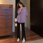 Elbow-sleeve Embroidered T-shirt / Boot-cut Pants