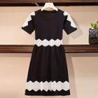 Short-sleeve Lace Paneled A-line Knit Dress