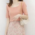 Set: Short-sleeve Plain Knit Top + Floral Midi A-line Skirt