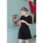 Set: Round-neck T-shirt + Band-waist Skort