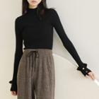 Ruffle-hem Stand-collar Knit Top