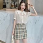 Frilled Trim Short-sleeve Blouse / Plaid A-line Skirt