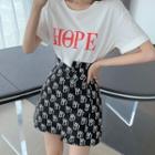 Short-sleeve Lettering T-shirt / High-waist Asymmetric Printed Skirt