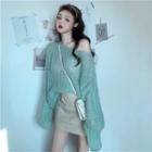 Perforated Oversized Sweater / Faux Leather High-waist Skirt