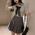 Short-sleeve Polo Shirt / Bow Tie / Pleated A-line Skirt / Set