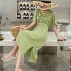 Short-sleeve Faux Pearl Buttoned Midi Sheath Dress