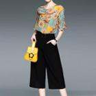 Set: Floral Print Elbow-sleeve Top + Wide Leg Cropped Pants