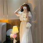 Short-sleeve Ribbon Blouse / A-line Skirt