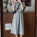 Zip-up Short-sleeve T-shirt / Midi A-line Skirt