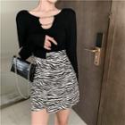 Round-neck Chain-accent Asymmetrical Hem Crop Top / High Waist Zebra Print Mini Skirt