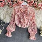 Ruffled Printed Bell-sleeve Blouse