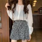 Long-sleeve Buttoned Sheer Top / Floral Print A-line Mini Skort