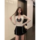 Long-sleeve Lace-up Cutout Top / Cropped Camisole / Mini A-line Skirt