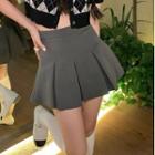 Short-sleeve Argyle Knit Top / Pleated A-line Skirt