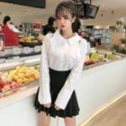 Long-sleeve Cutout Shirt / A-line Mini Pleated Skirt