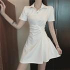 Short-sleeve Asymmetric Crinkled A-line Mini Polo Dress