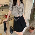 Short-sleeve Plaid Shirt / Asymmetrical Pleated Mini A-line Skirt
