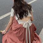 Short-sleeve Ribbon Back T-shirt / A-line Midi Skirt