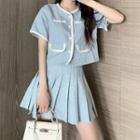 Short-sleeve Buttoned Blouse / Pleated A-line Mini Skirt