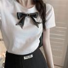 Short-sleeve Bow Accent T-shirt / Mini A-line Skirt
