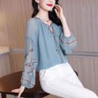 Long-sleeve Floral Embroidered Tie-neck Blouse