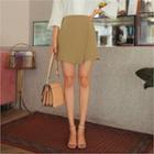 Band-waist Asymmetric Miniskirt