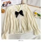 Bow-accent Ruffled V-neck Blouse Almond - One Size
