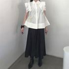 Sleeveless Ruffle Shirt / Midi A-line Skirt