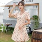Short-sleeve Asymmetric Buttoned Polka Dot Chiffon A-line Dress