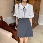 Short-sleeve Tie-neck Blouse / Asymmetrical Hem Mini Skirt