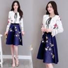 Set: Bell Sleeve Lace Up Print Top + Embroidered A-line Skirt