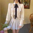 Ribbon Tie-neck Shirt / Pleated Mini A-line Skirt