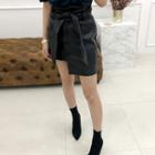 Asymmetric-hem Faux-leather Miniskirt With Sash