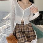 Long-sleeve V-neck T-shirt / Plaid Mini Pleated Skirt