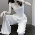 Plain T-shirt / High-waist Wide-leg Pants