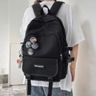 Set: Buckled Nylon Backpack + Pin + Bag Charm