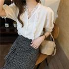 Short-sleeve V-neck Lace Blouse / Irregular Print Midi Skirt