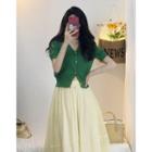 Short-sleeve V-neck Cardigan / Midi A-line Skirt